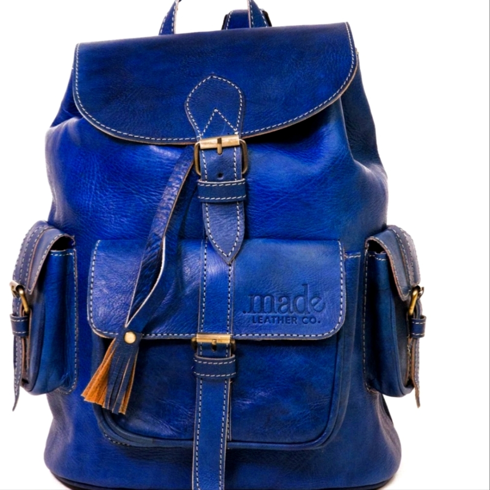 Made Leather Co backpack with leather salve, also matching wallet. Price is firm